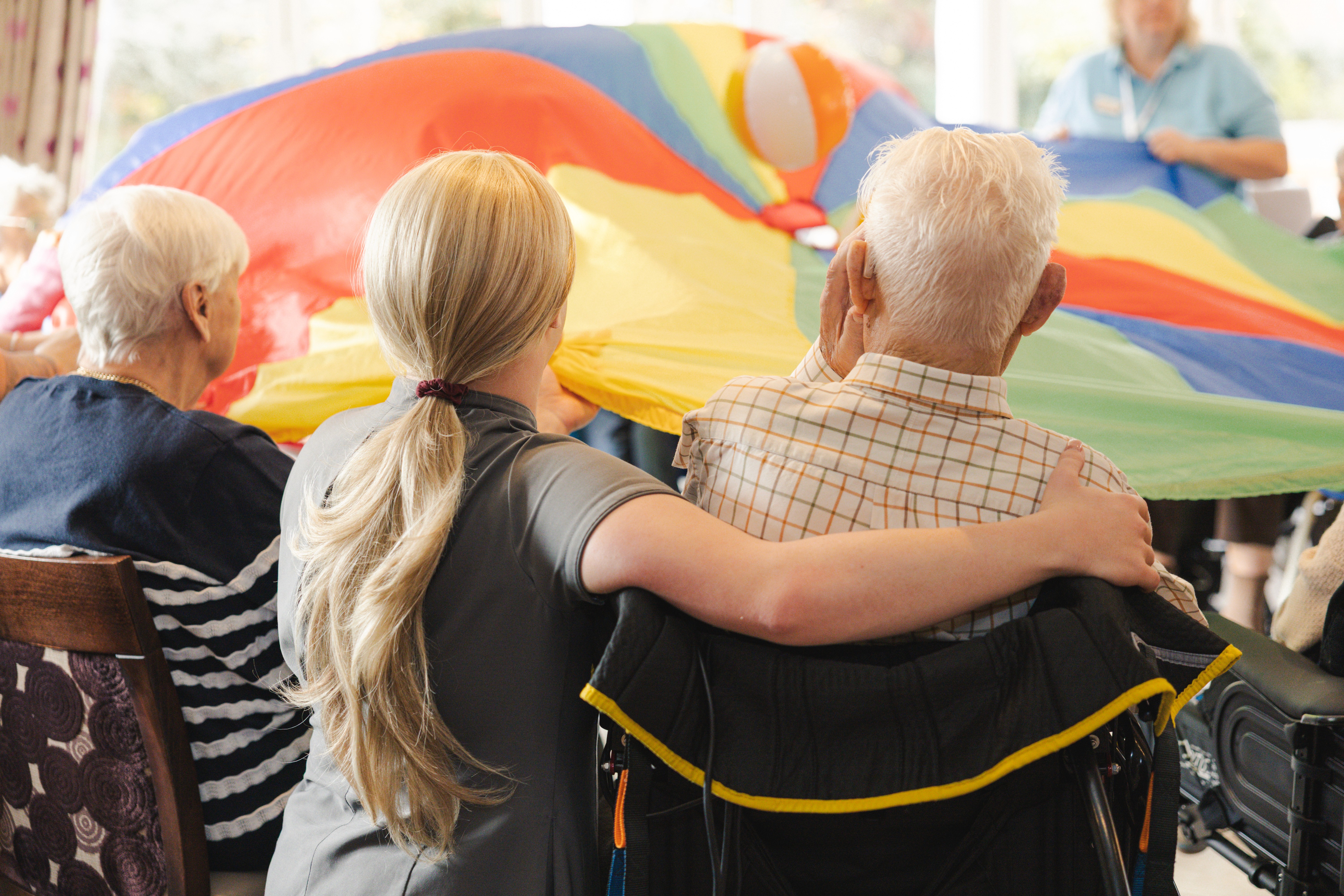 Residents and staff enjoying an activities session at Bradfield Manor